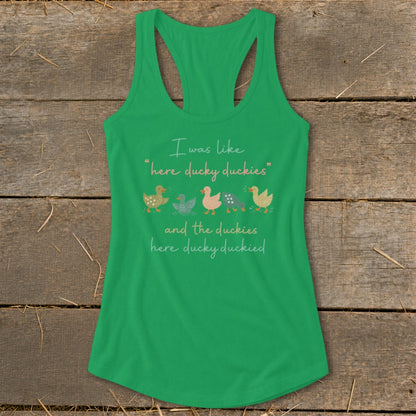 Green tank top with cartoon ducks and text: "I was like "here ducky duckies" and the duckies here ducky duckied."