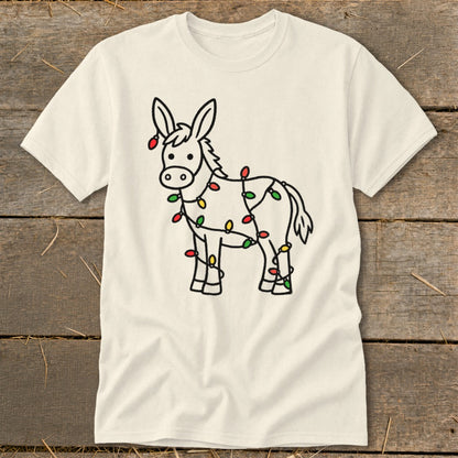 Cream t-shirt with a line drawing of a donkey wrapped in colorful Christmas lights.