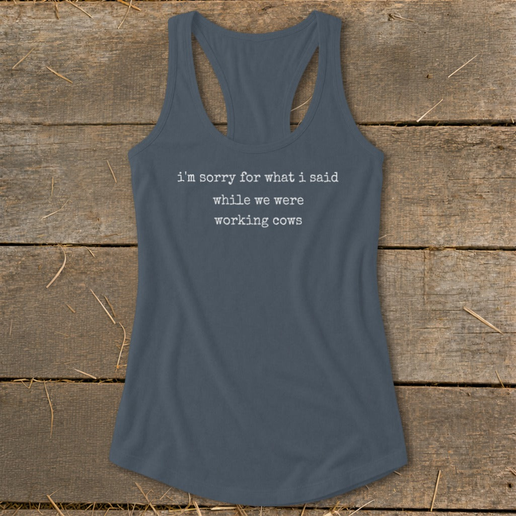 Tank top with white text: "i'm sorry for what i said while we were working cows"