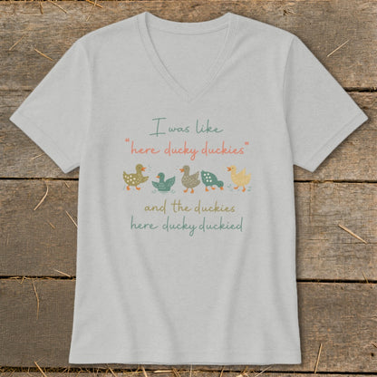 Light grey v-neck t-shirt with a humorous duck illustration and text.