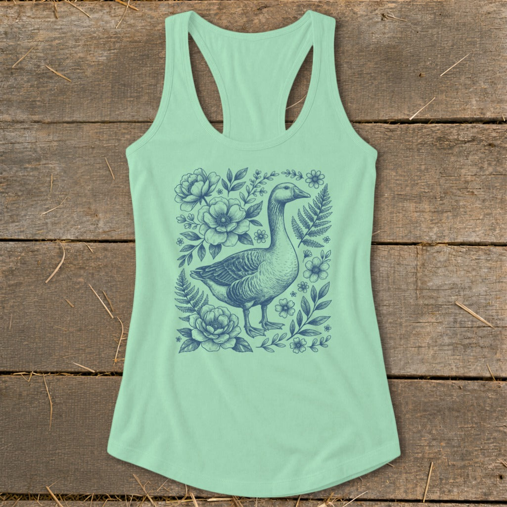 Pale green tank top with a blue goose and floral illustration on the front.