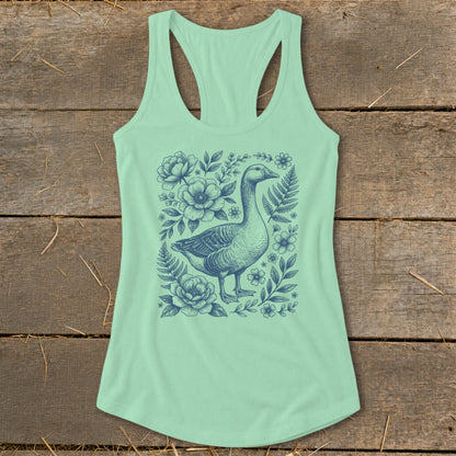 Pale green tank top with a blue goose and floral illustration on the front.