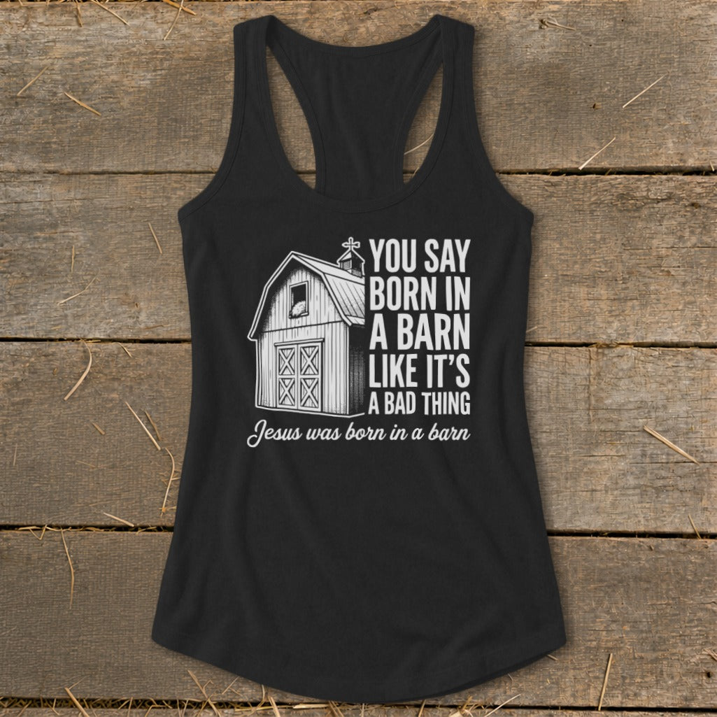 Black tank top with barn graphic and text "Jesus was born in a barn."