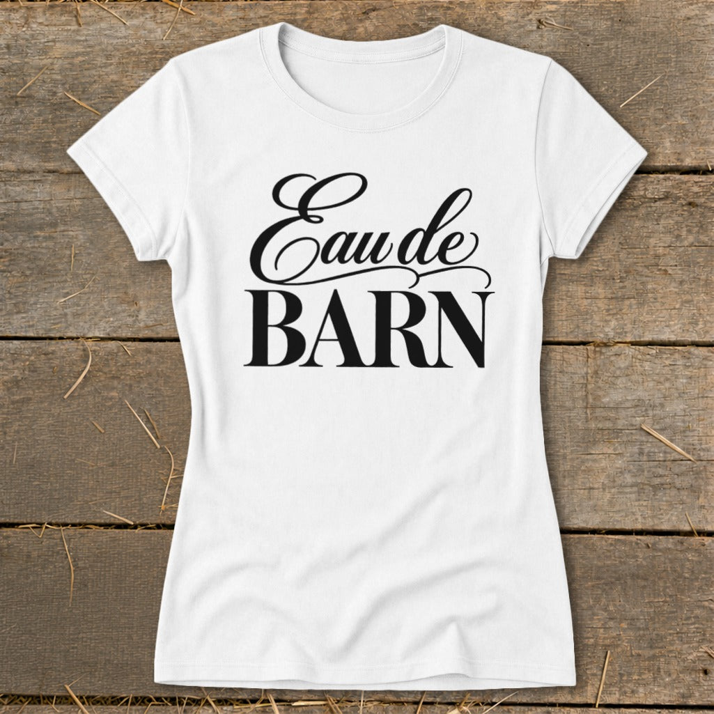White t-shirt with black text reading "Eau de BARN"