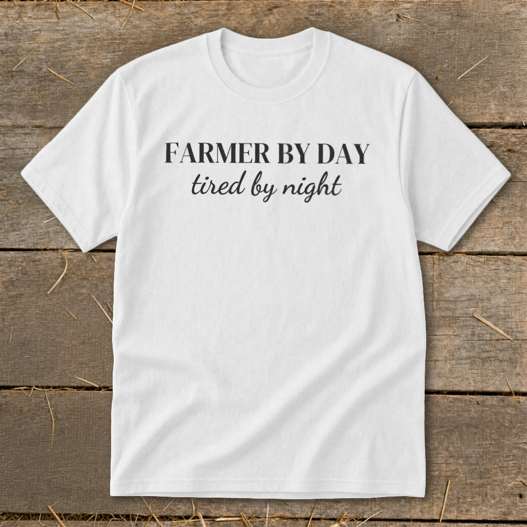 White t-shirt with "FARMER BY DAY tired by night" text.