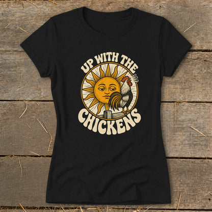 Black t-shirt featuring a retro graphic of a sun, rooster, and the text Up With The Chickens.