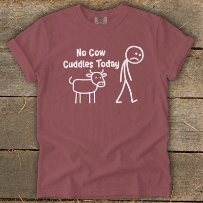 Maroon t-shirt with "No Cow Cuddles Today" text and stick figures of a cow and person.