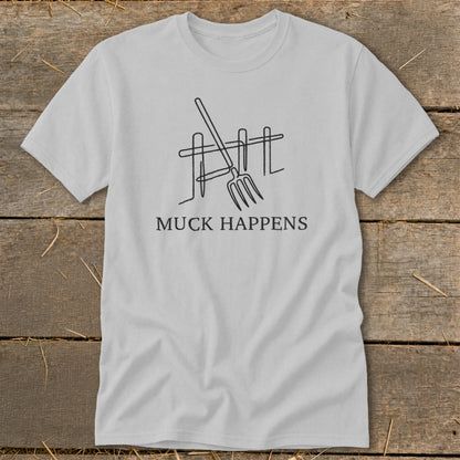 Grey t-shirt with a black line drawing of a pitchfork and fence, and the text "MUCK HAPPENS".