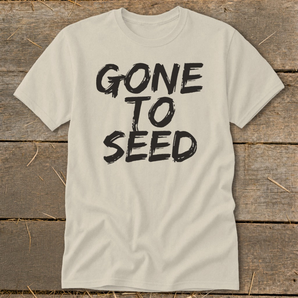 Light tan t-shirt with black distressed text reading "GONE TO SEED".