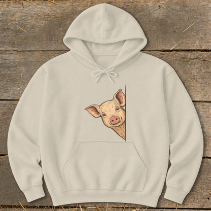 Cream hoodie with a drawing of a pig peeking from the side.