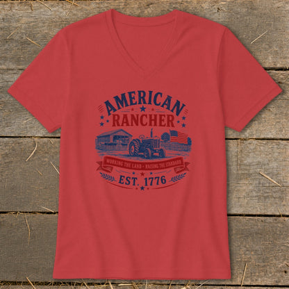 Red t-shirt with "American Rancher Est. 1776" graphic featuring a barn, tractor, and flag.