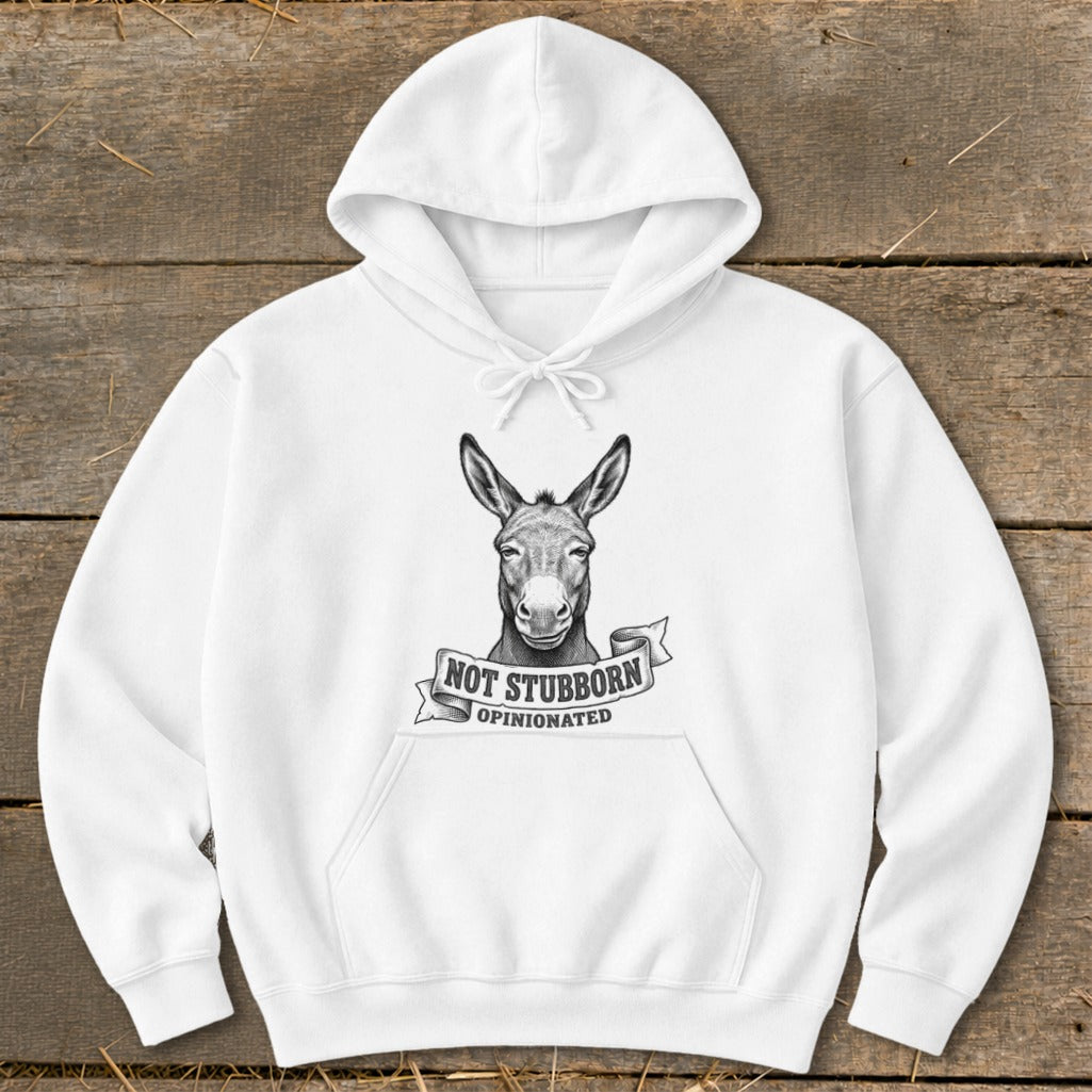 White hoodie with a sketched donkey graphic and text "NOT STUBBORN OPINIONATED".