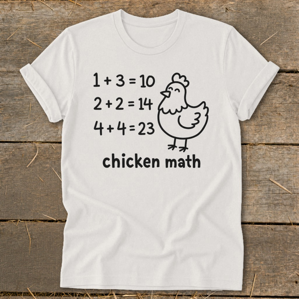 White t-shirt with cartoon chicken and "chicken math" text with funny equations.