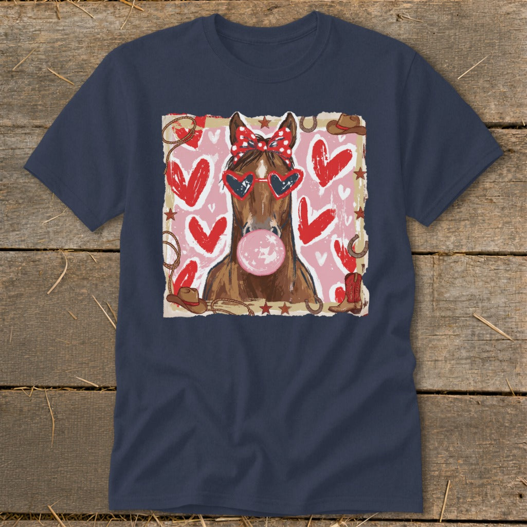 Horse with heart sunglasses and bubblegum, surrounded by hearts and western graphics.