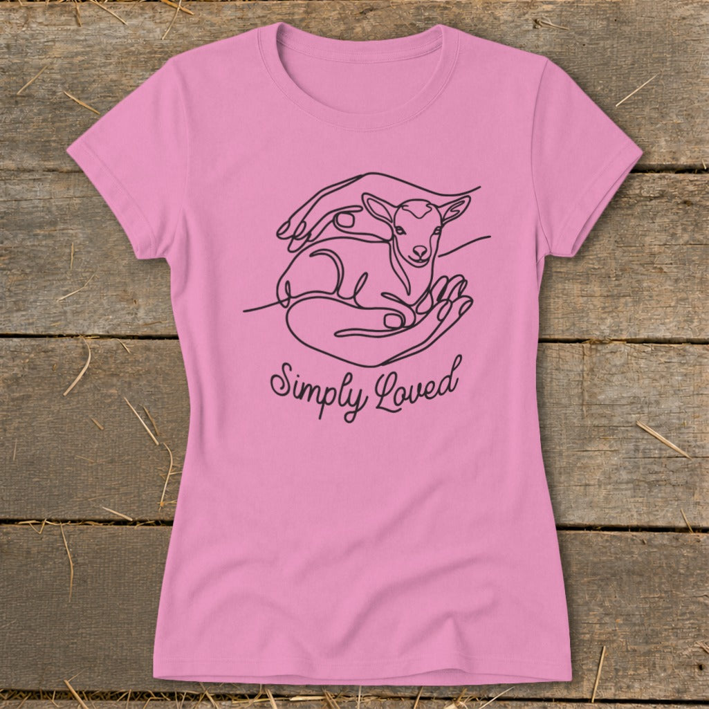 Pink t-shirt with line art of hands holding a lamb and the text "Simply Loved".