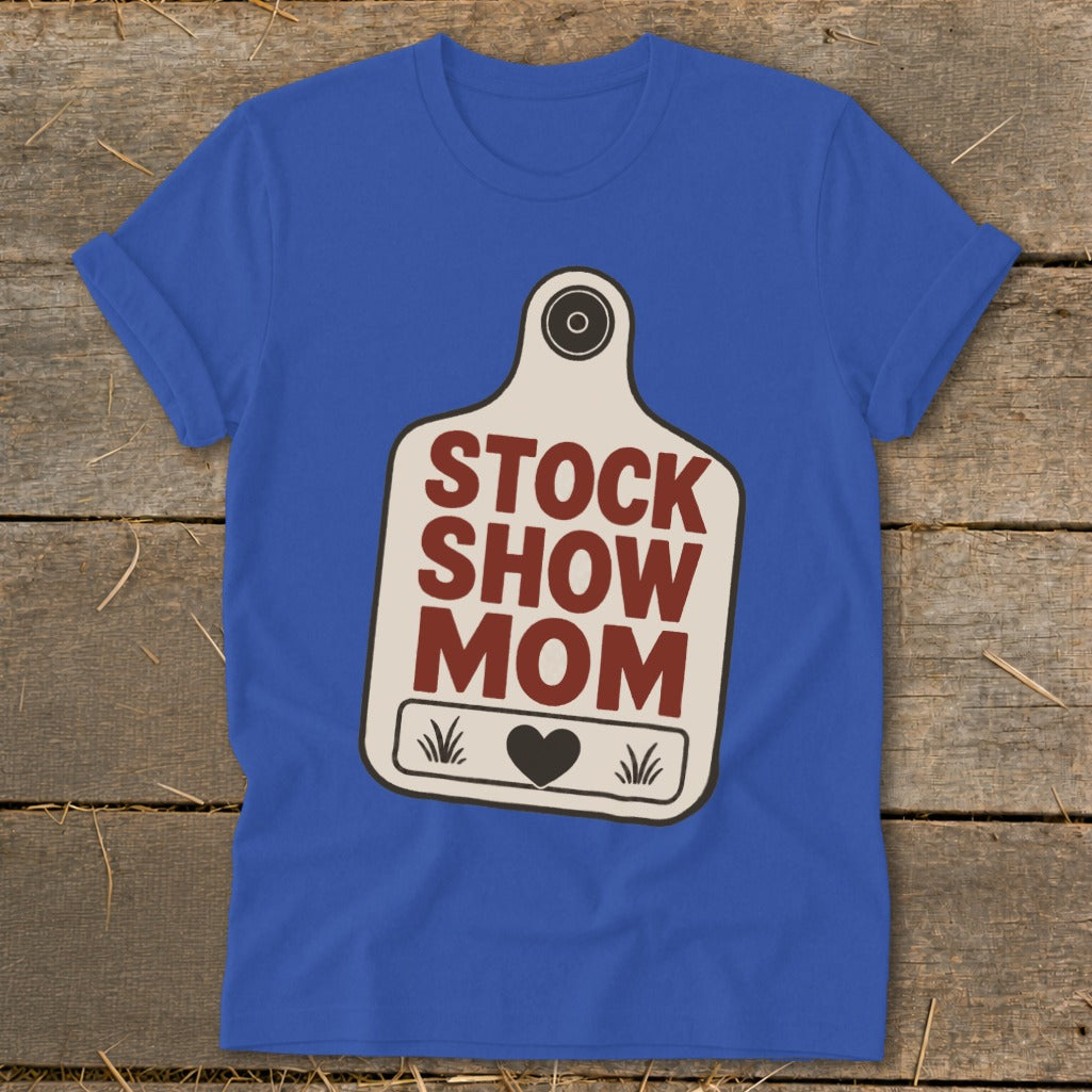 Blue t-shirt with a stock tag graphic that reads "STOCK SHOW MOM".