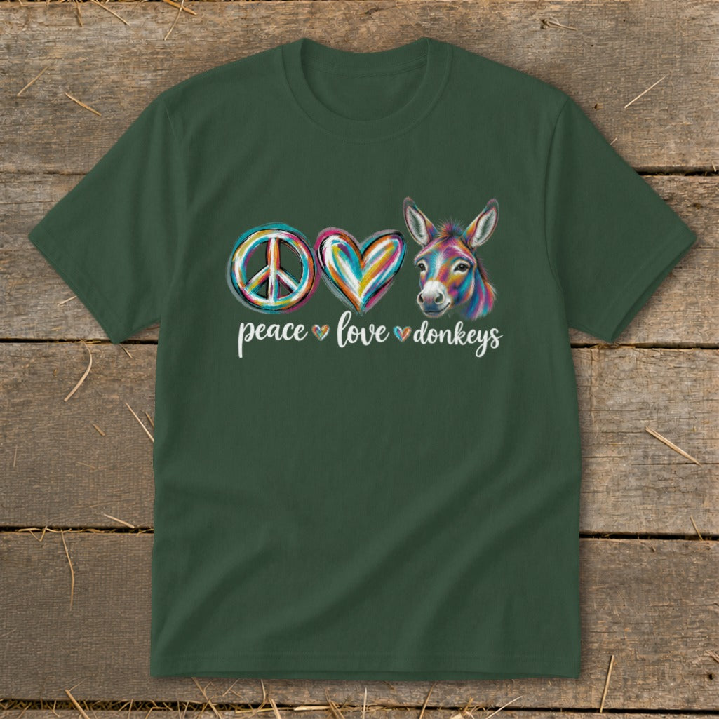 Green t-shirt with peace symbol, heart, and colorful donkey graphic saying "peace love donkeys."