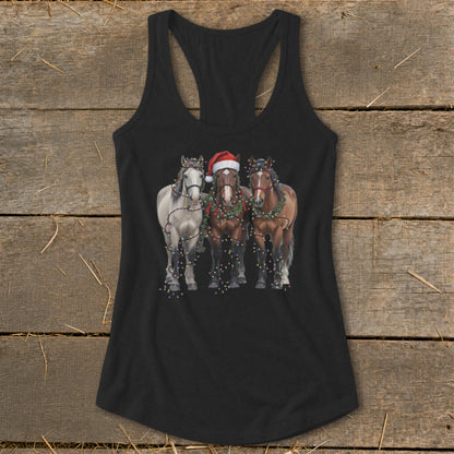 Three horses wearing Santa hat and Christmas lights on a tank top.