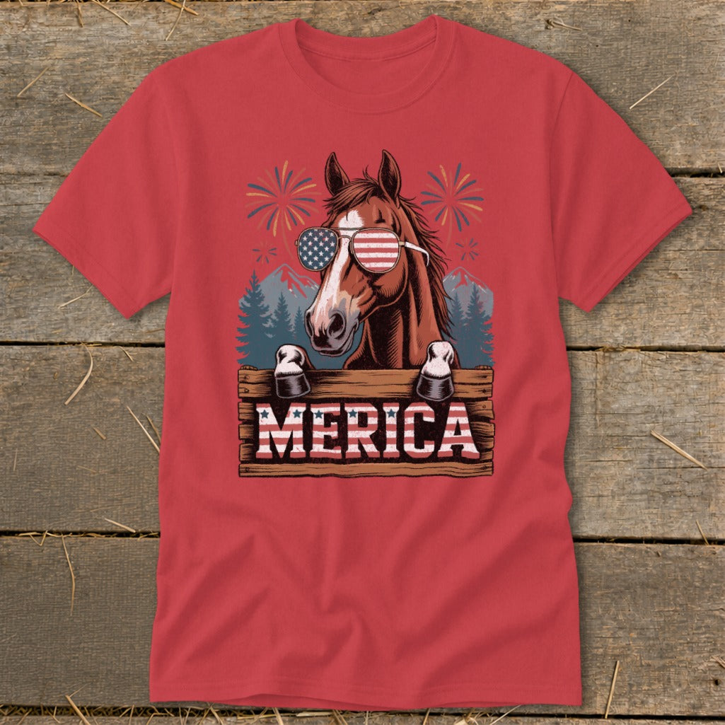 Horse wearing American flag sunglasses with "MERICA" text and fireworks.