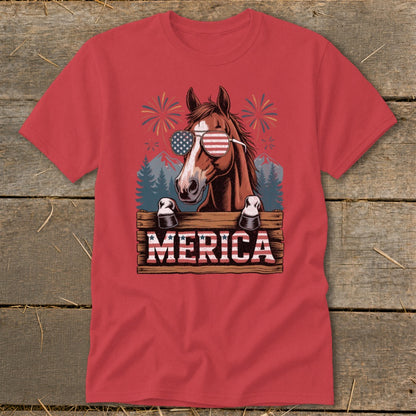 Horse wearing American flag sunglasses with "MERICA" text and fireworks.