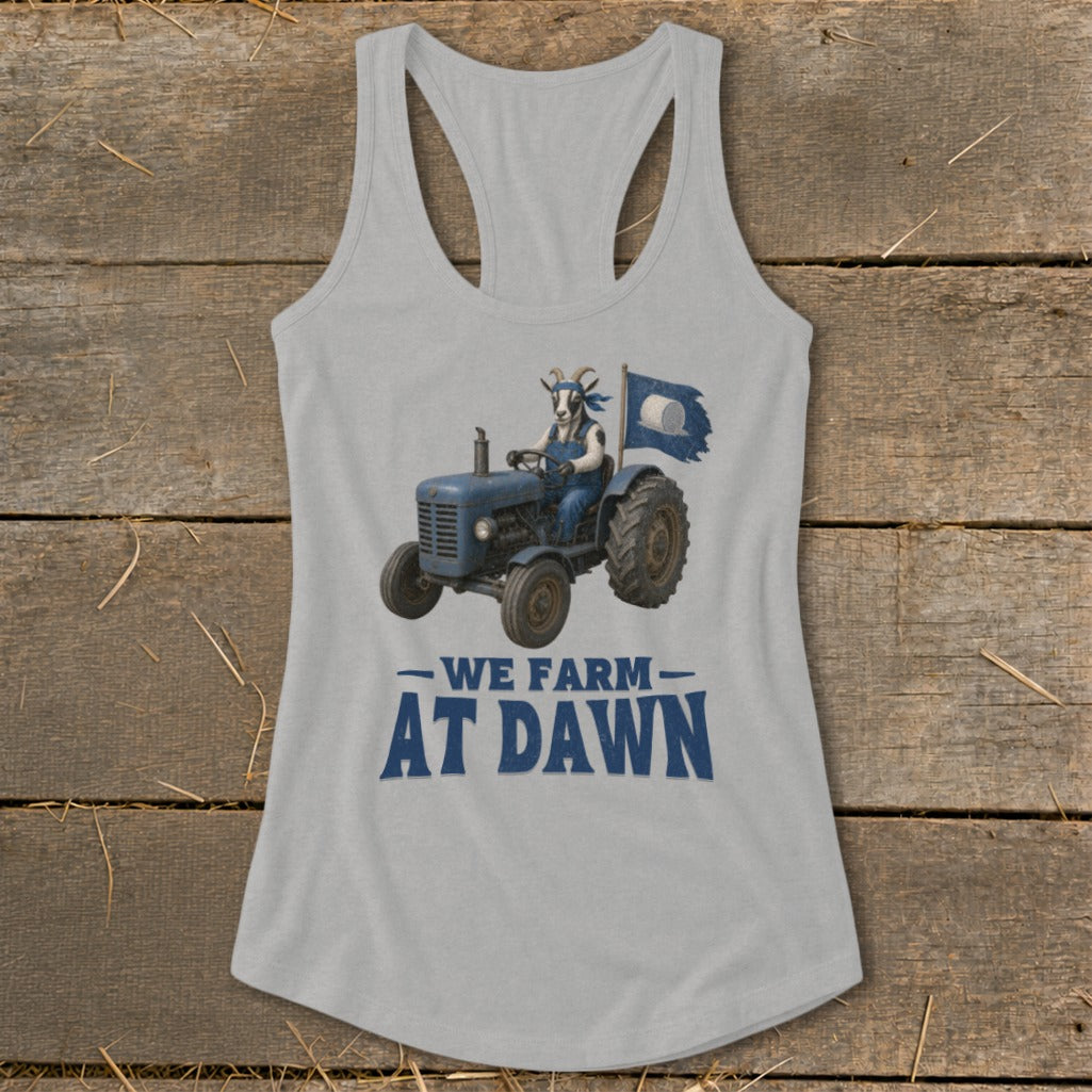 Goat in overalls drives blue tractor with flag, text "We Farm At Dawn".