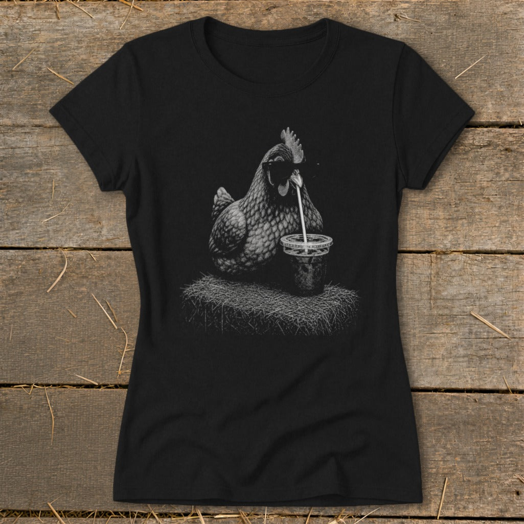 Black t-shirt with a drawing of a chicken drinking from a cup with a straw.