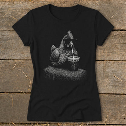Black t-shirt with a drawing of a chicken drinking from a cup with a straw.