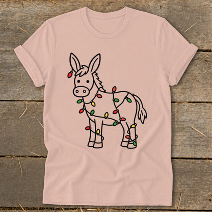 Donkey wearing a string of red, green, and yellow Christmas lights.