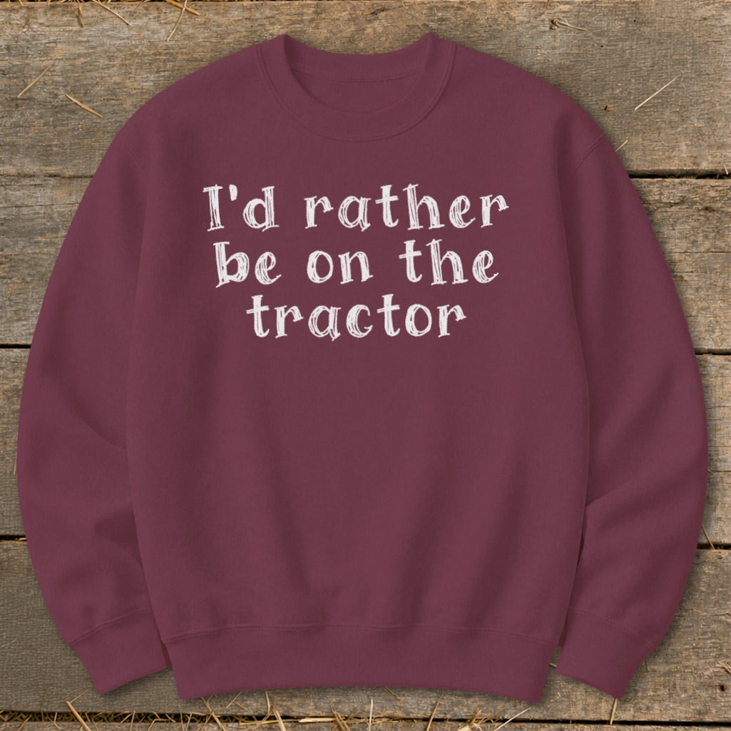 Burgundy sweatshirt with white text "I'd rather be on the tractor".
