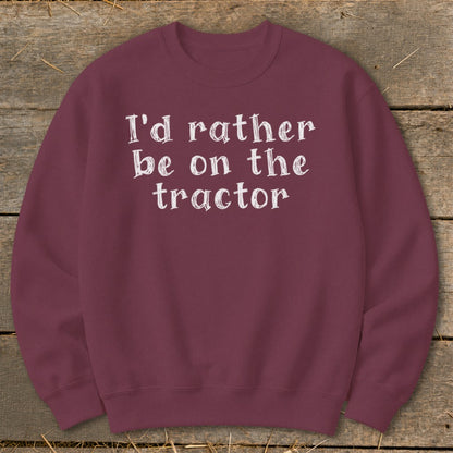 Burgundy sweatshirt with white text "I'd rather be on the tractor".