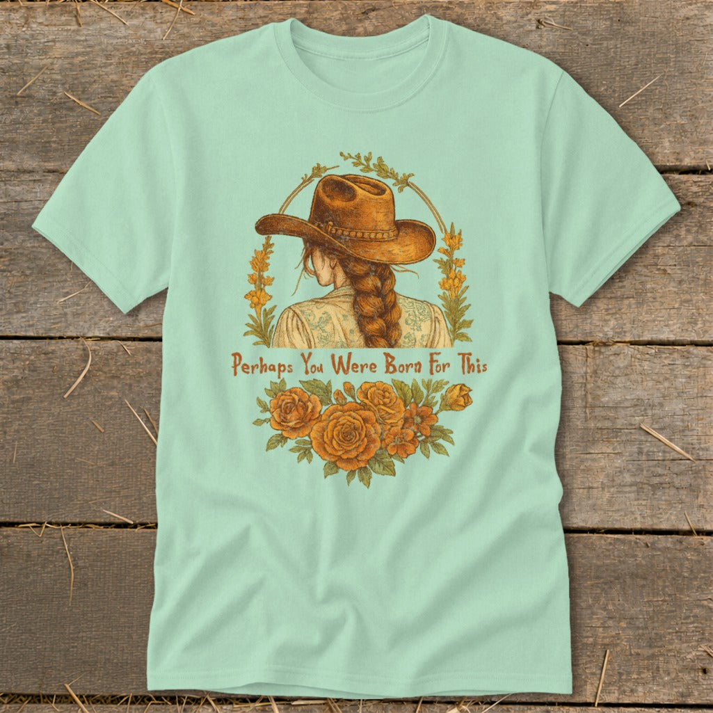 Mint t-shirt with a drawing of a woman wearing a cowboy hat and text "Perhaps You Were Born For This".
