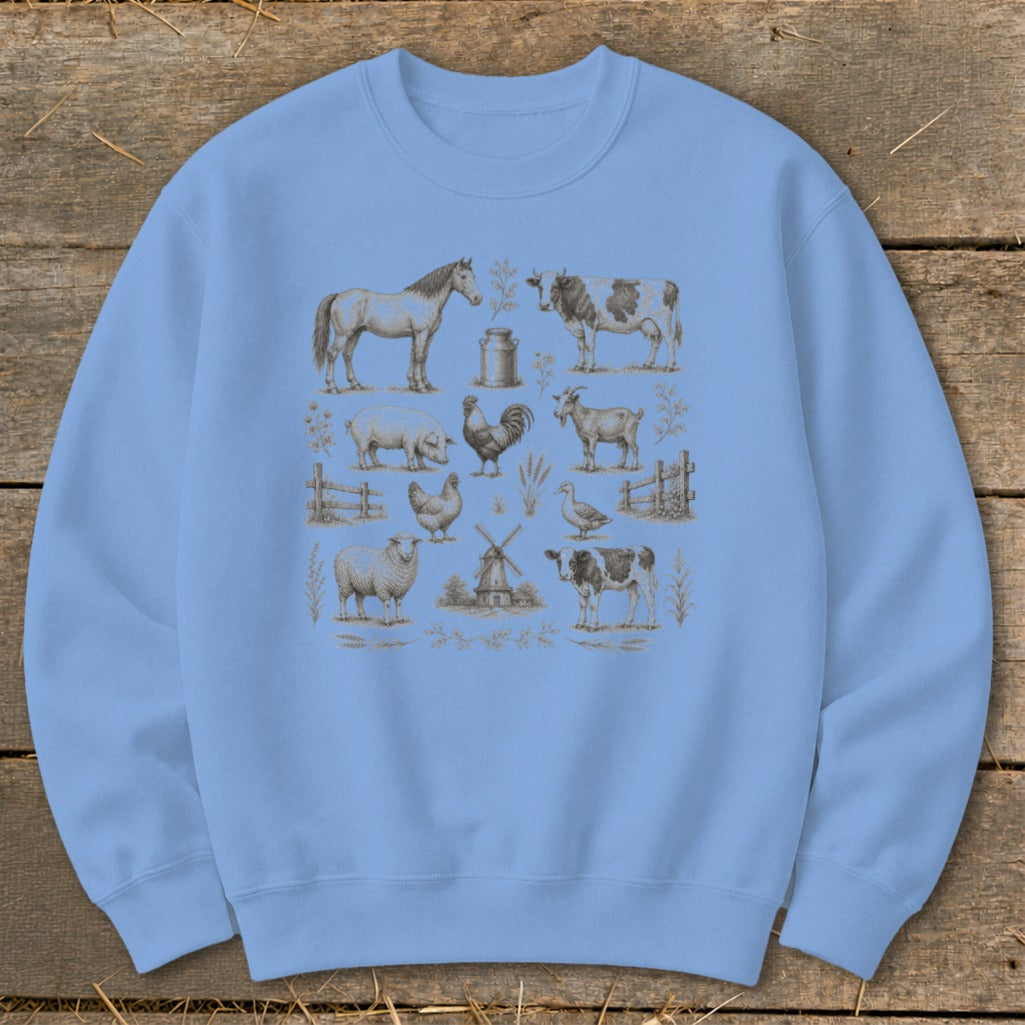 Light blue sweatshirt with a vintage farm animal print including horse, cow, pig, and sheep.