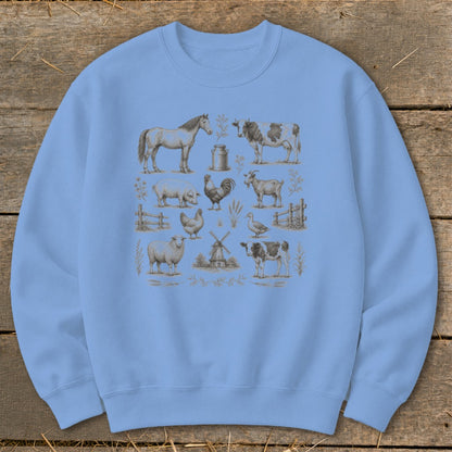 Light blue sweatshirt with a vintage farm animal print including horse, cow, pig, and sheep.