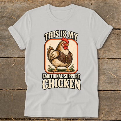Chicken wearing vest, text "This is my emotional support chicken".