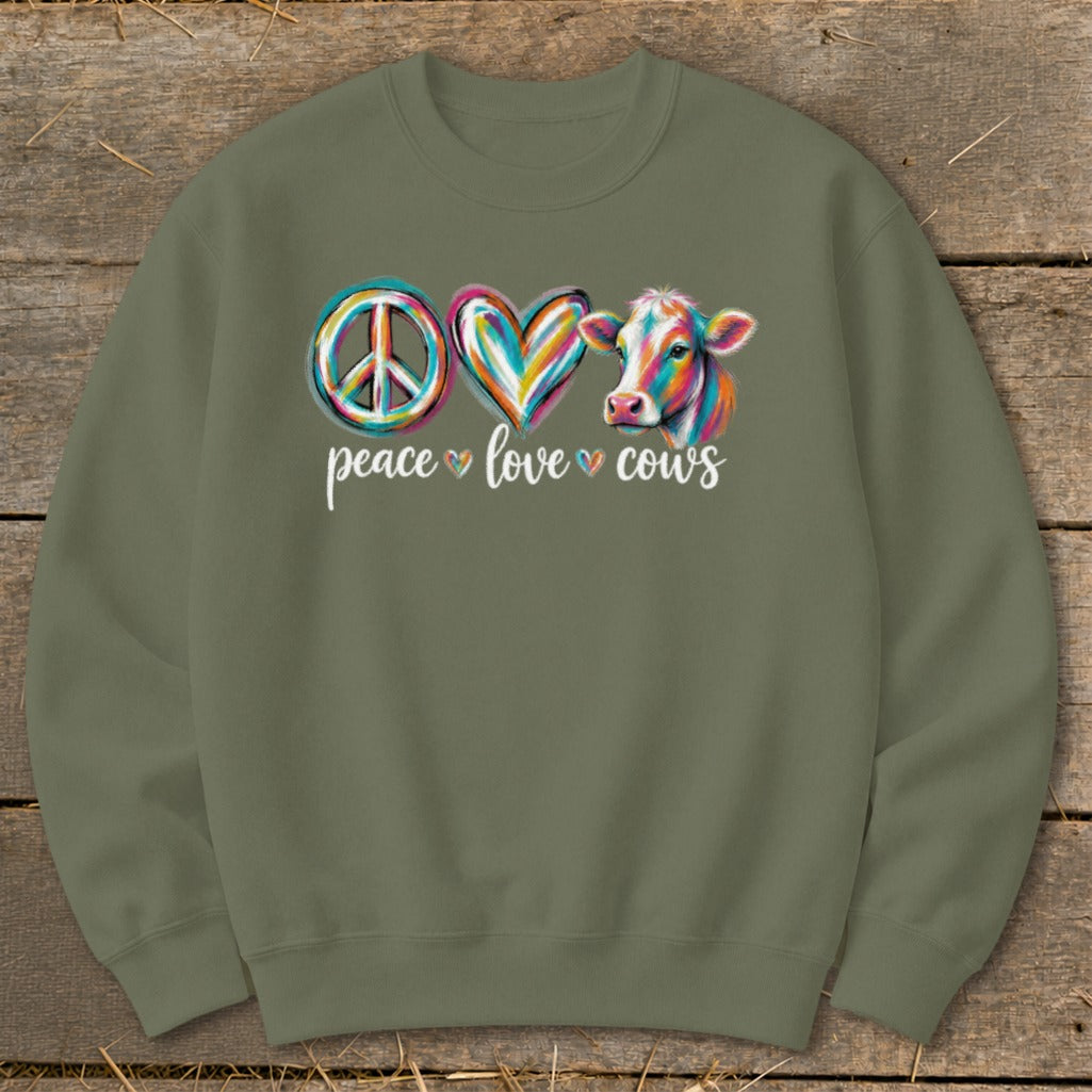 Peace love cows graphic with colorful peace sign, heart, and cow on olive green sweatshirt.