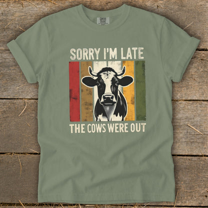 T-shirt with a cow graphic and the text "Sorry I'm Late, The Cows Were Out".