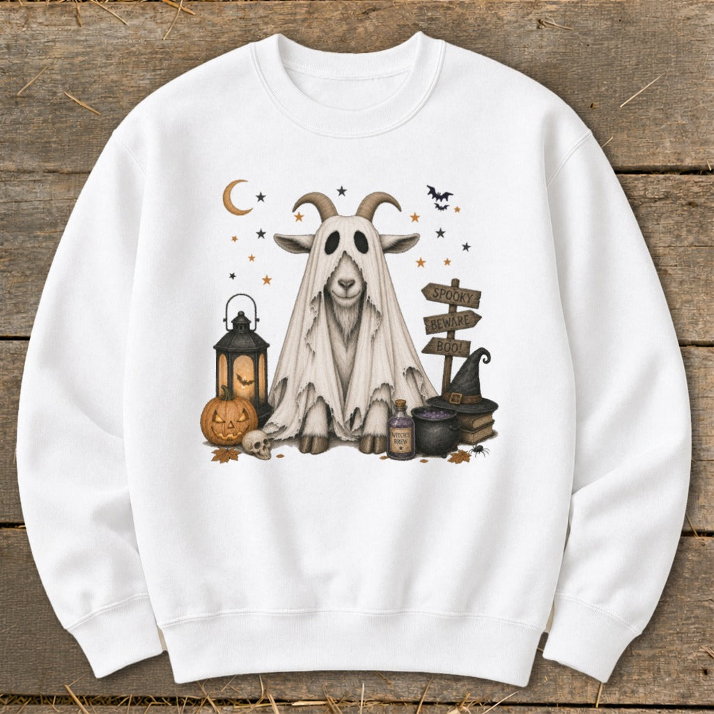 Goat dressed as a ghost with Halloween decorations and spooky sign.