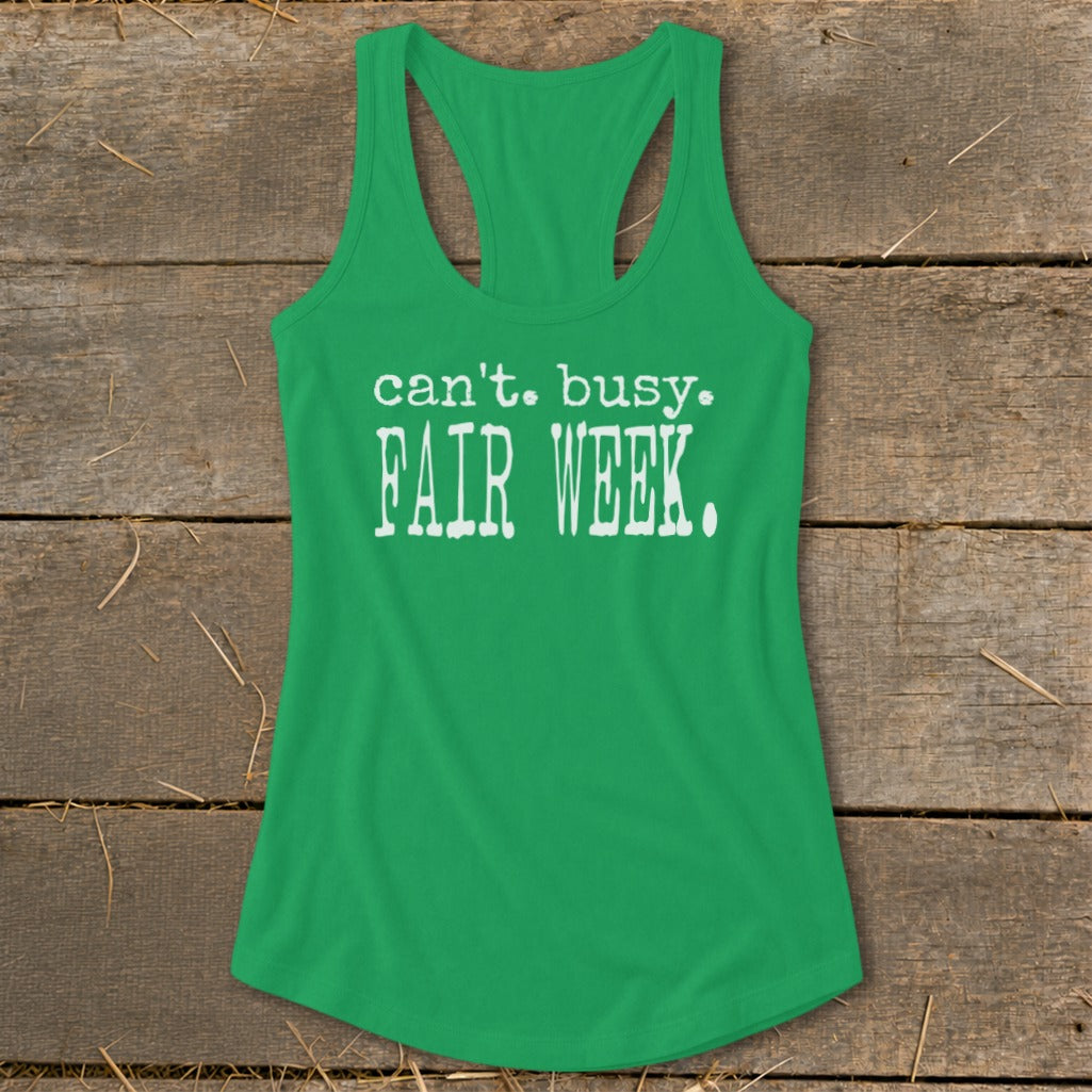 Green tank top with white text that reads "can't. busy. FAIR WEEK."
