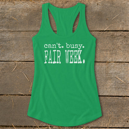 Green tank top with white text that reads "can't. busy. FAIR WEEK."