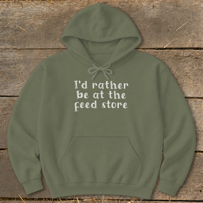 Olive green hoodie with white text "I'd rather be at the feed store"