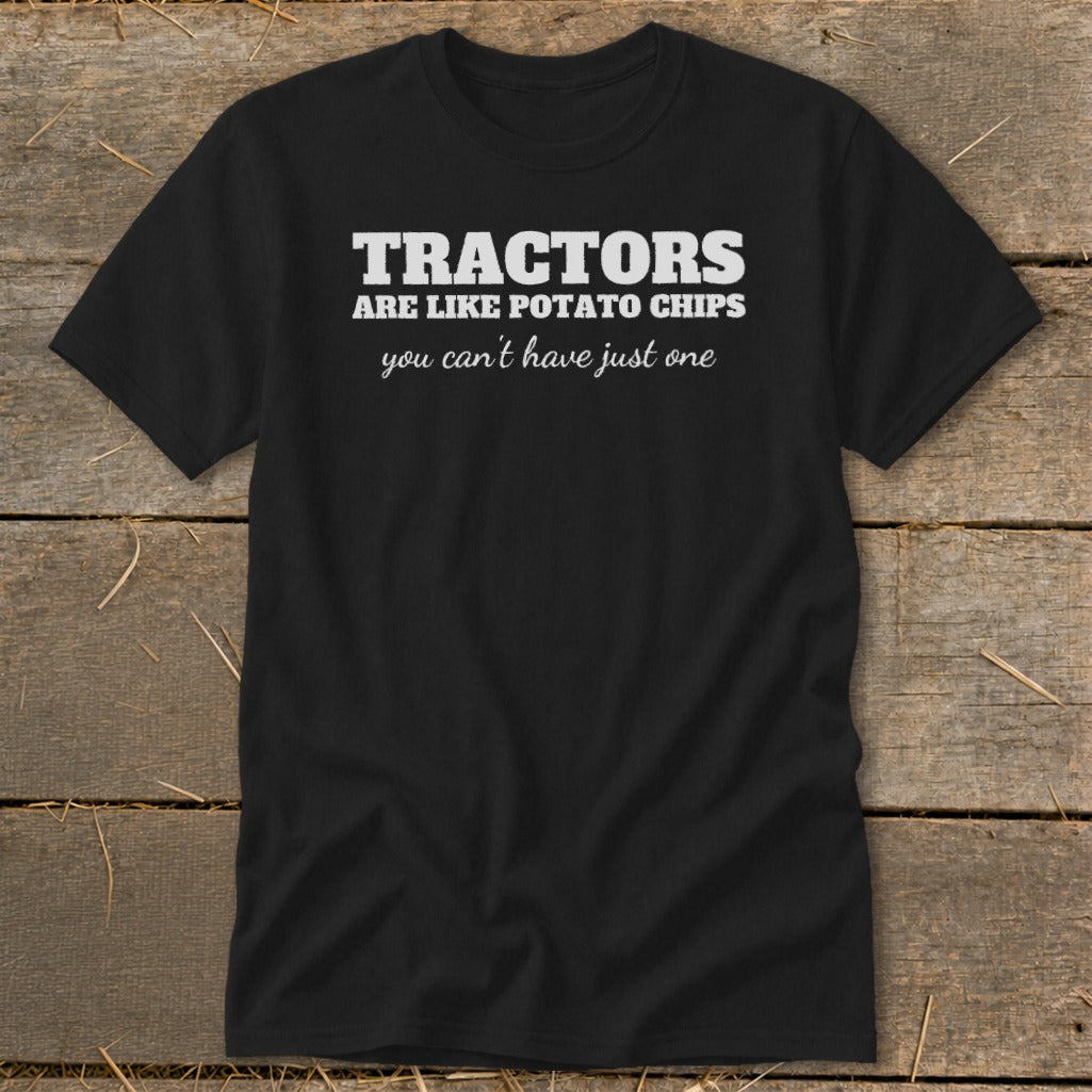 Black t-shirt with white text reading "Tractors are like potato chips, you can't have just one."