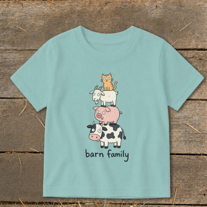 Light blue t-shirt with cartoon barn animals stacked and the words "barn family."