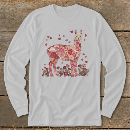 Long sleeve shirt with a llama covered in pink flowers and hearts.