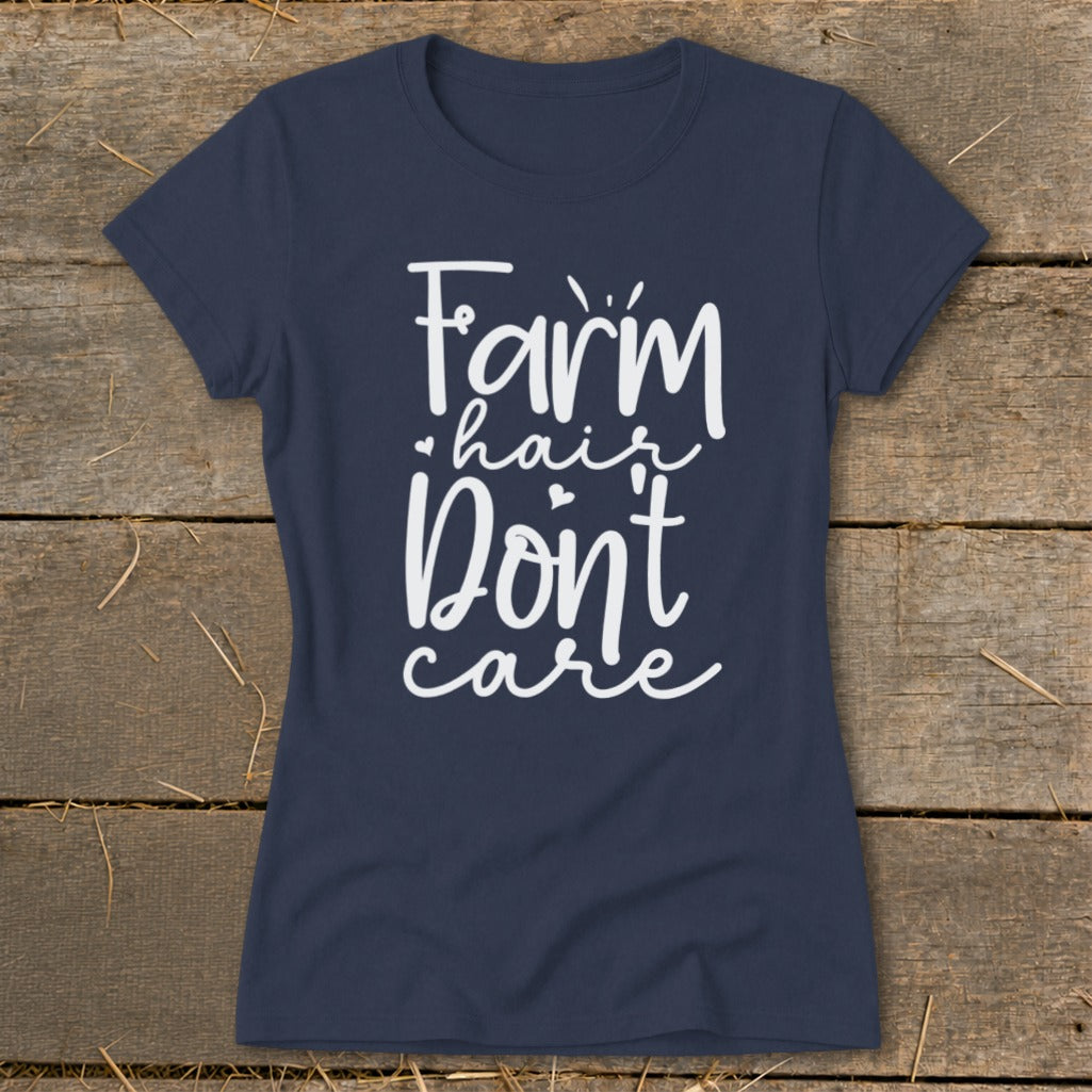 Navy t-shirt with "Farm hair don't care" white text design.