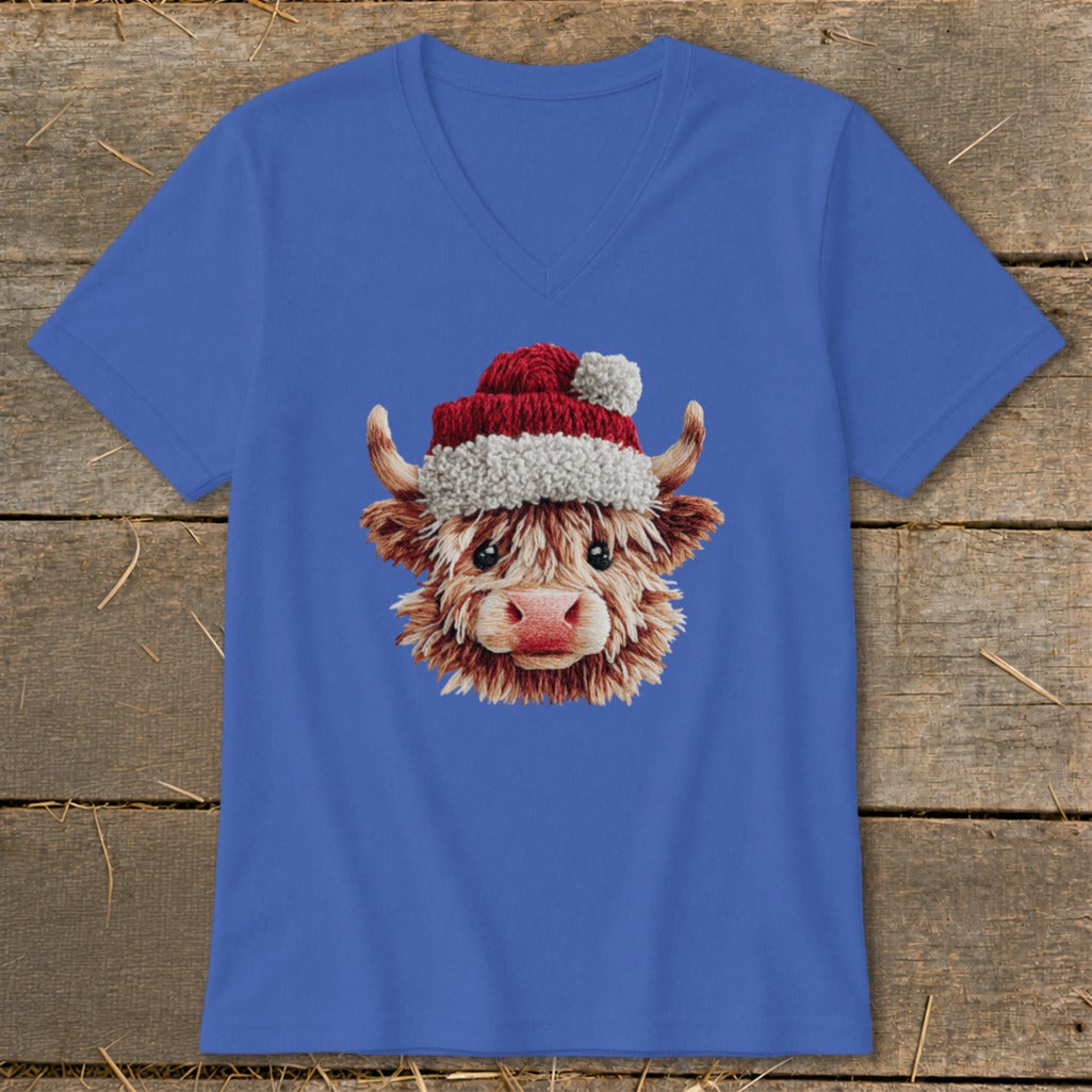 Blue v-neck t-shirt with a Highland cow wearing a Santa hat graphic.