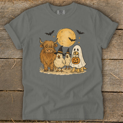 Highland cow, chicks in witch hats, and dog in ghost costume with pumpkin bucket.