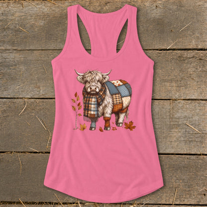 Pink tank top featuring a fluffy Highland cow wearing a plaid scarf and patchwork coat.