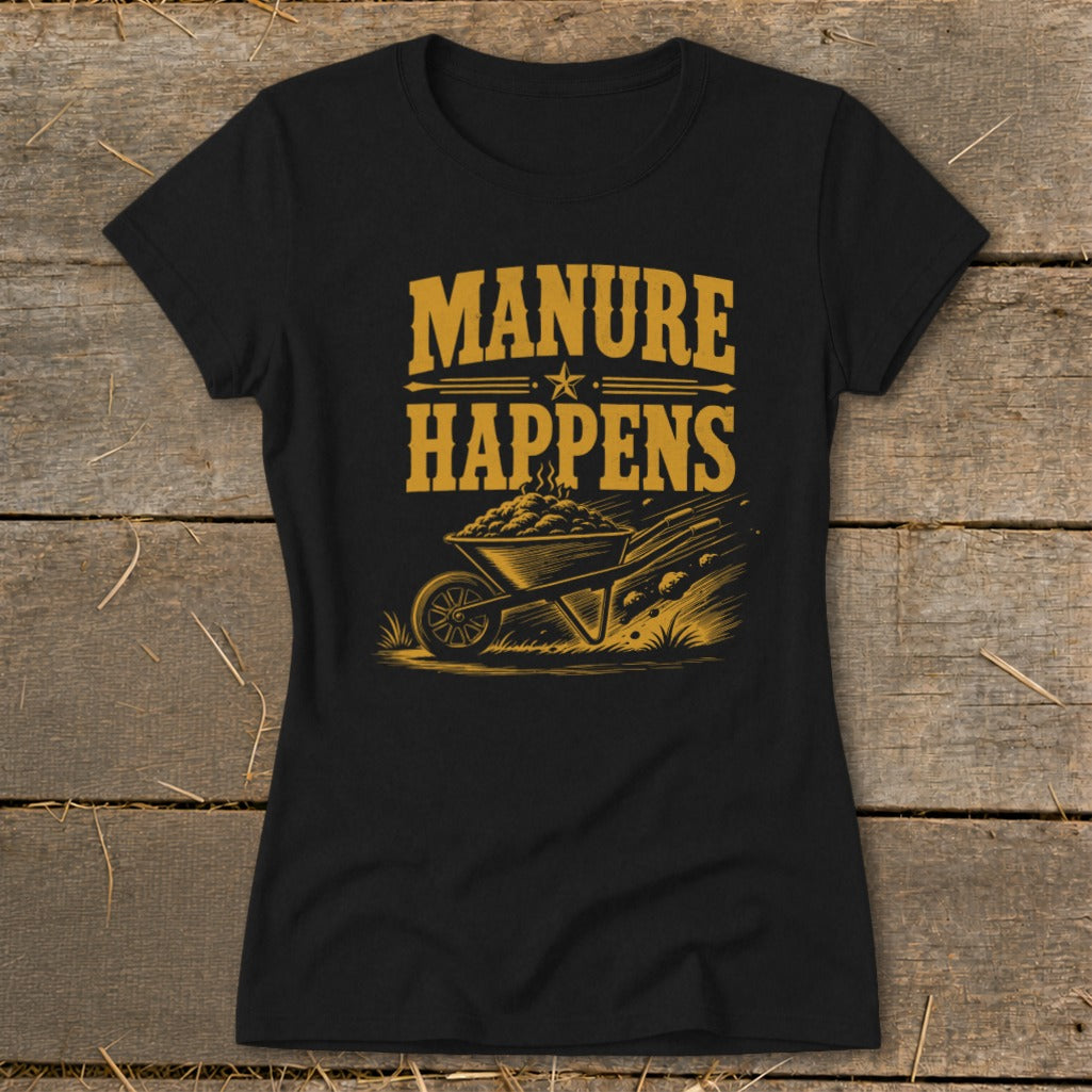 Black t-shirt with gold text "Manure Happens" and a wheelbarrow full of manure.