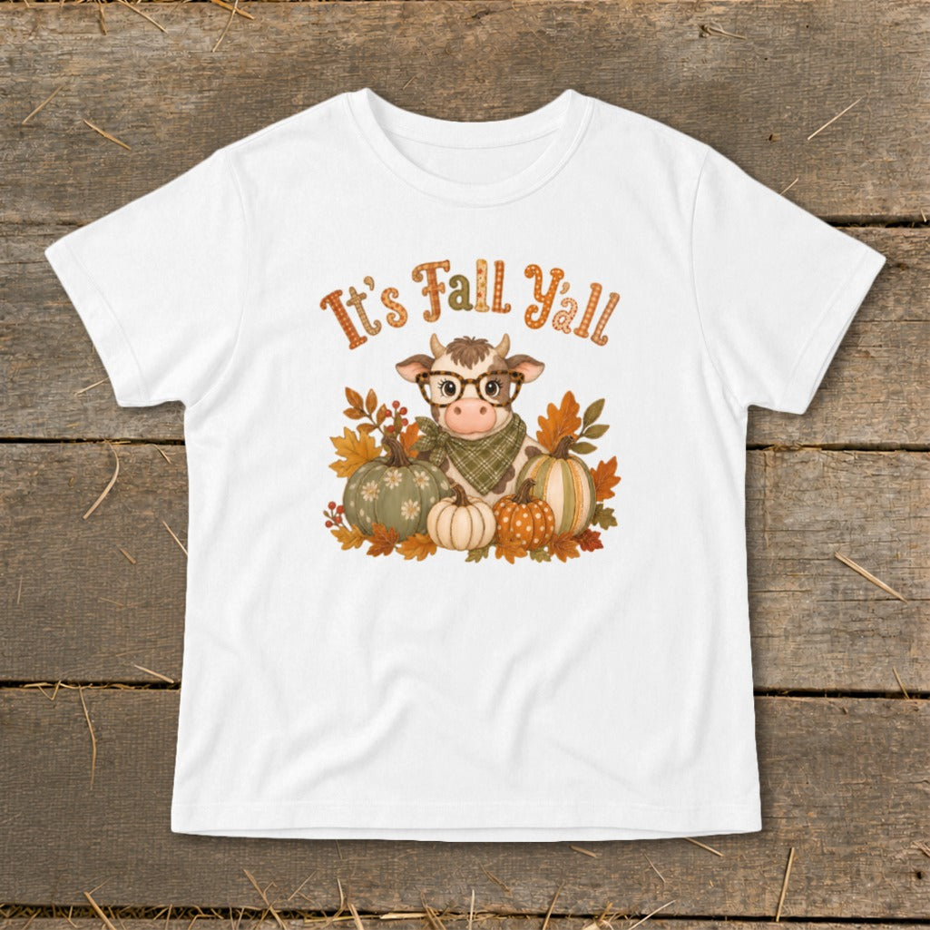 White t-shirt with cow graphic, pumpkins, leaves, and "It's Fall Y'all" text.