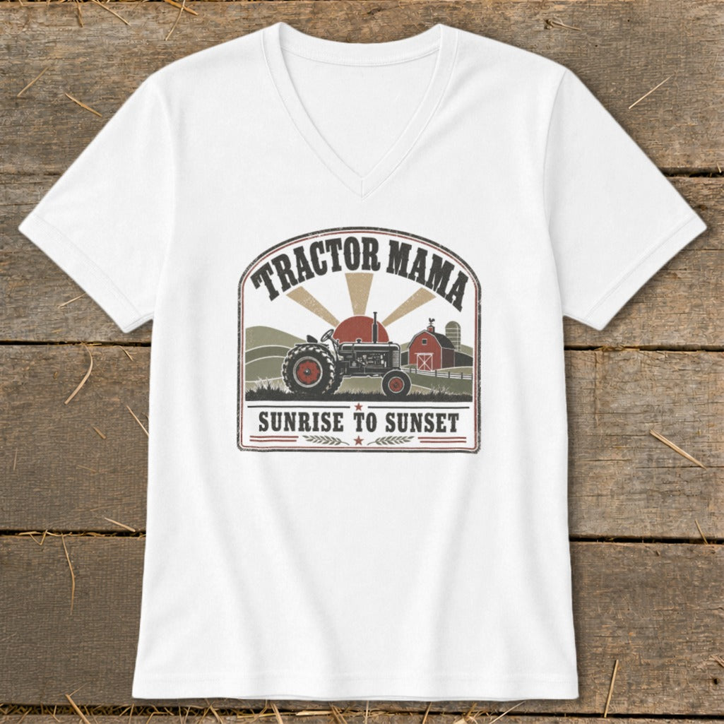 White v-neck t-shirt graphic with tractor, barn, and text "Tractor Mama Sunrise to Sunset".